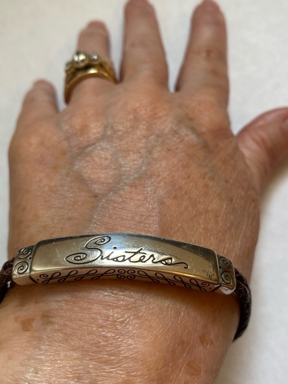Brighton. Sisters Engraved Brown Braided Leather Bracelet
